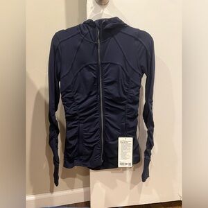 Ruched navy blue define jacket with hood.